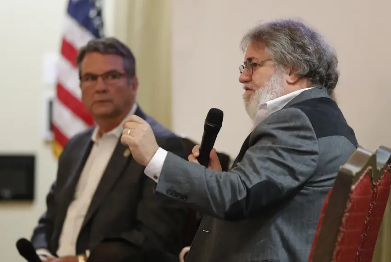 Former chair of the Texas Water Development Board Carlos Rubinstein speaks at a panel discussion as state Sen. Charles Perry, R-Lubbock, looks on, at the McKenzie-Merket Alumni Center at Texas Tech University on Nov. 18, 2022.